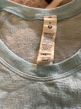Lululemon Size 6 Light Blue Heather Top